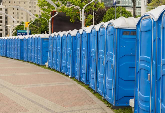 a row of portable restrooms for a special event, ensuring guests have access to clean facilities in Dartmouth, MA